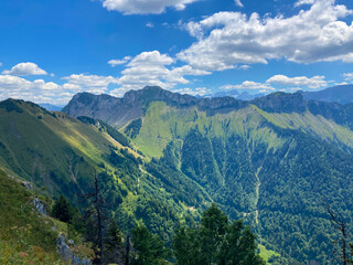 Naklejka premium Montreux, Switzerland: 01-08-2022: Panorama of the Switzerland Alpine mountains. Ridges, peaks and lake are visible in the background. Beautiful view in the French Canton.