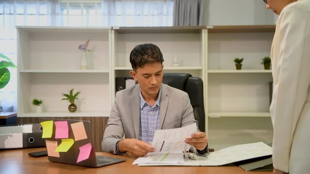 Businessman and businesswoman argue about documents, dissatisfied partners disagree with non-performance or bad collaboration result, canceling deal, breach of contract, noncompliance with obligation