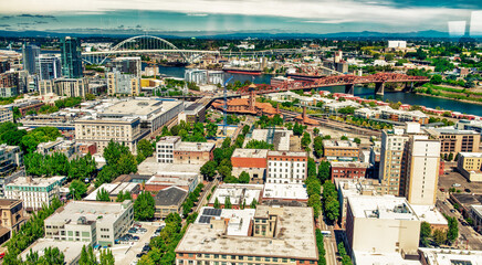Obraz premium Aerial view of city buildings on a summer day, Portland - Oregon