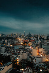 Fototapeta premium Aerial view of Ho Chi Minh City, commonly known by its previous name, Saigon is the largest and most populous city in Vietnam. Travel and business concept