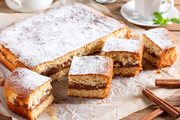 Fresh sponge cake with apples. Chiffon biscuit on table