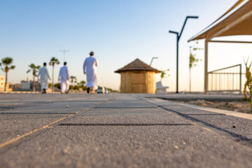 city park people walking on the road
