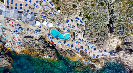 Overhead aerial view of beautiful mediterranean beach and coastline in summer season.