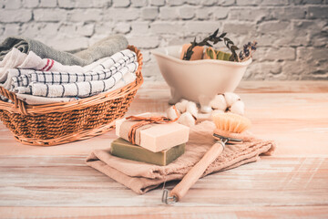 Fototapeta na wymiar Handmade natural bar soaps and cotton towels. Ethical, sustainable zero waste lifestyle