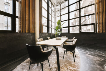 Spacious luxury living room with table and chairs