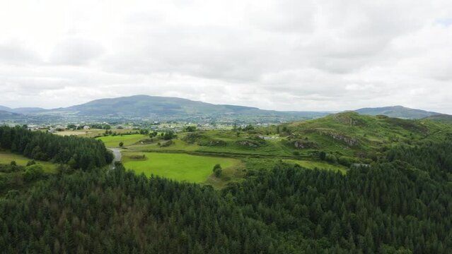 Aerial Flight of the flagstaff viewpoint area, countryside, Newry, Northern Ireland during the summer. Hiking and Tourism concept