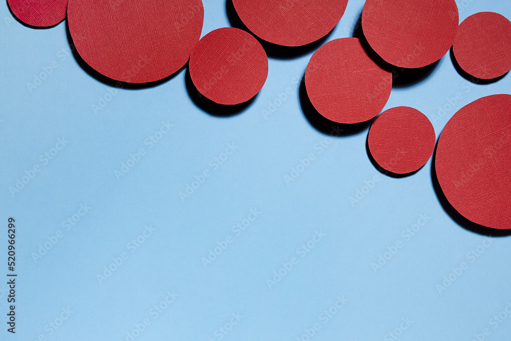 Poster colorful abstract background with red textured circles as decorative swarm, border with copy space f