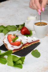 dissertation strawberry pie with cream on a light background vertical photo
