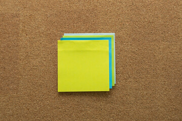 multiple sticky  note on cork board concept using sticky notes 