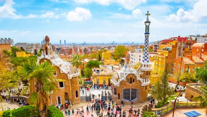 Zelfklevend Fotobehang General view of Park Güell entrance and Barcelona city skyline, Spain © Arcady