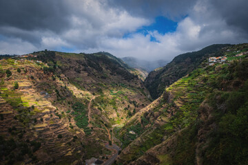 Naklejka premium Panoramic view from Ponta do Sol village on Madeira island, Madeira, Portugal. October 2021. Long exposure picture.