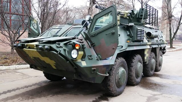 An armored personnel carrier of the Ukrainian army stands in the courtyard of a military unit before being sent to a combat zone. Ukraine has been defending its territories since Russia's invasion