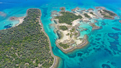 Aerial drone photo of tropical exotic island complex forming a blue lagoon with crystal clear turquoise sandy beaches