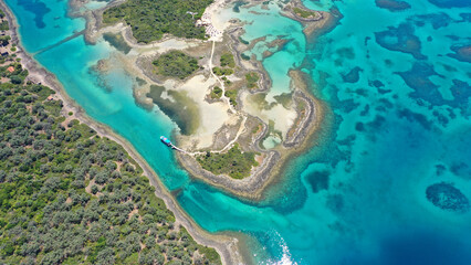 Obraz premium Aerial drone photo of tropical exotic paradise island complex in Mediterranean sea forming a blue lagoon archipelago with crystal clear turquoise sea sandy beaches