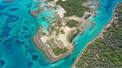 Aerial drone photo of tropical exotic paradise island complex in Mediterranean sea forming a blue...