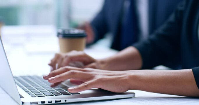Closeup hands typing on laptop, planning and checking while lawyers prepare contract, defense or closing argument for paralegal court case. Attorneys researching a case on technology for client