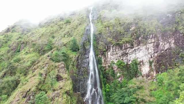 aerial view of a waterfall in a thailand forest