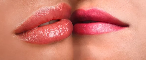Closeup view of girls kissing each other. Lesbian couple © New Africa