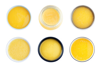Set with tasty ghee butter on white background, top view