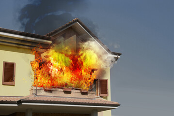 Modern house engulfed in flames. Fire safety violations