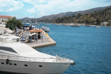 Fototapeta premium Beautiful view of sea with boats and coastal city