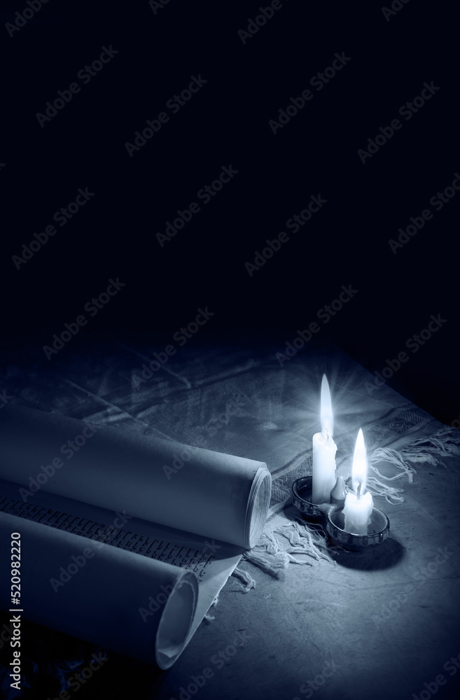 Wall mural ancient scroll lit by candlelight