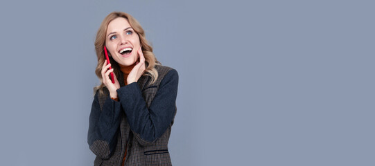 happy business woman in checkered english jacket speak on phone, communication. Woman portrait, isolated header banner with copy space.
