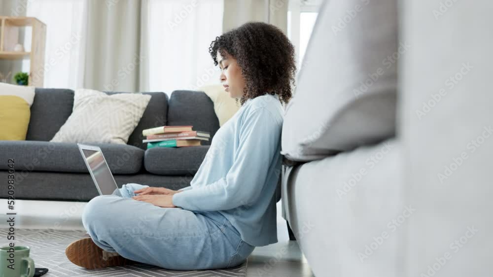 Poster Relaxed and comfortable university student typing on laptop and doing a homework assignment, studying for a test or writing an academic essay. Smart, busy and thinking woman sitting on the floor