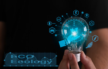 The concept of men holding lamps shows the energy of the Internet, sustainable development, renewable energy, and natural resource protection Environmental protection, electric vehicles, power plants