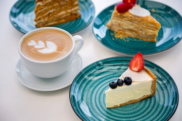 Different types of cakes with coffee