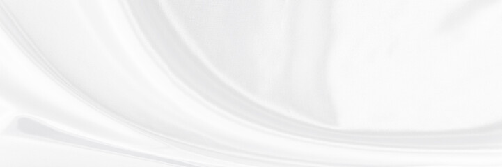 White gray satin texture that is white silver fabric silk background with beautiful soft blur pattern natural.