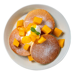 Delicious Japanese souffle pancake with dice mango and jam on white table background.