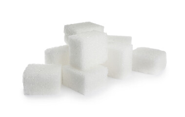 Pile of refined sugar cubes on white background