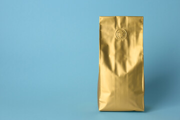 One blank foil package on light blue background. Space for text
