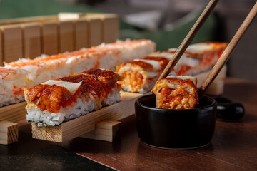 Preparation for rolls with rice, shrimps, eel