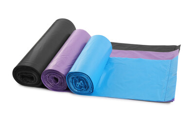 Rolls of different garbage bags on white background. Cleaning supplies