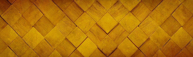 Abstract yellow golden colored wooden 3D cube, wood block wall texture background banner panorama long pattern
