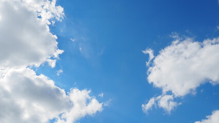 background clouds in a blue sky on a clear sunny day