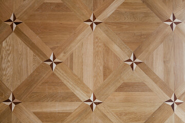 floor made of natural wood with handmade patterns