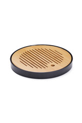 Detailed shot of a tea desk. The collapsible tea tray consists of a board and a pallet. The designer round melamine and bamboo tea table in chinese style is located on the white background.