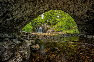 Fototapeta na wymiar Fairy-tale landscape, Eas Chia-Aig waterfalls, Highlands, Scotland