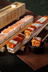 Preparation for rolls with rice, shrimps, eel