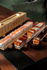 Preparation for rolls with rice, shrimps, eel