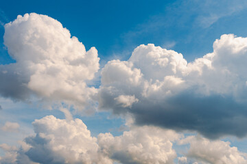 White, Fluffy Clouds In Blue Sky. Background From Clouds.