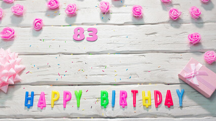happy birthday candle letters for a girl in pink shades with beautiful rose flowers, postcard...