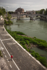 Tiber River with the Ponte Vittorio Emmanuelle II and the Castel Sant’ Angelo in the background...