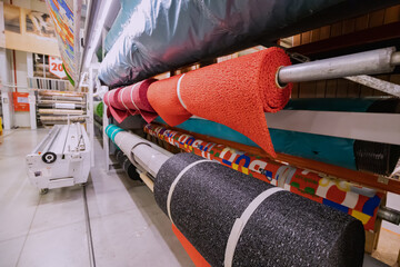 A rug in the hallway with a coarse material for absorbing dirt and moisture is sold for a cut in...