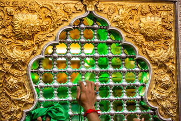 The shrine of Abbas, son of Imam Ali, peace be upon him, in Karbala, Iraq, with Imam Hussein, peace...