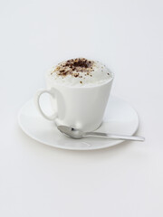 Coffee with milk in porcelain coffee cup