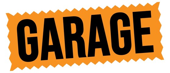GARAGE text written on orange-black stamp sign.